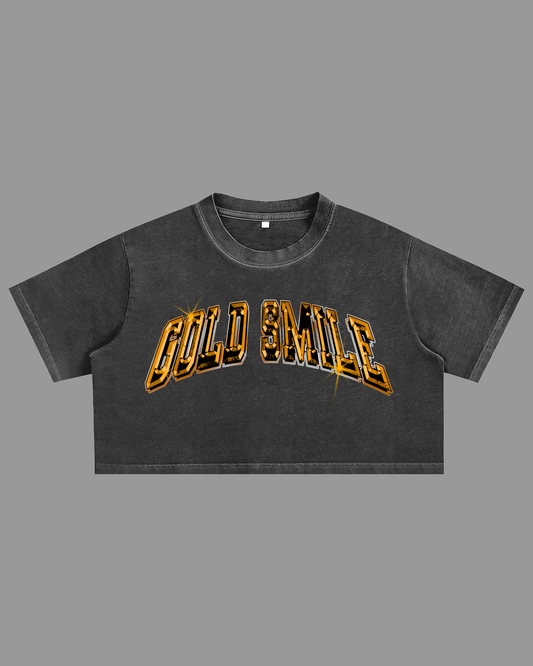 Black crop top with 'Gold Smile' text on a gray background